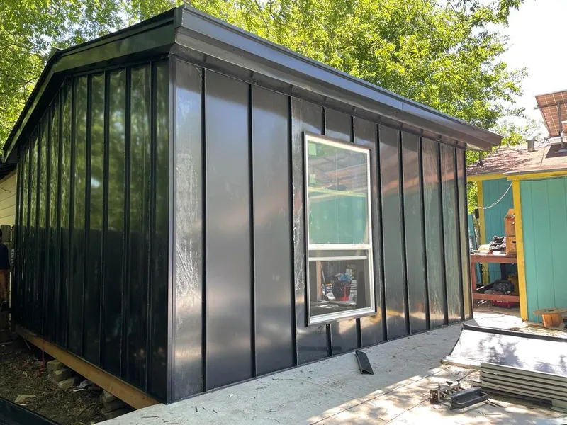 Black standing seam metal wall panels for Roof Inspection in Bealeton