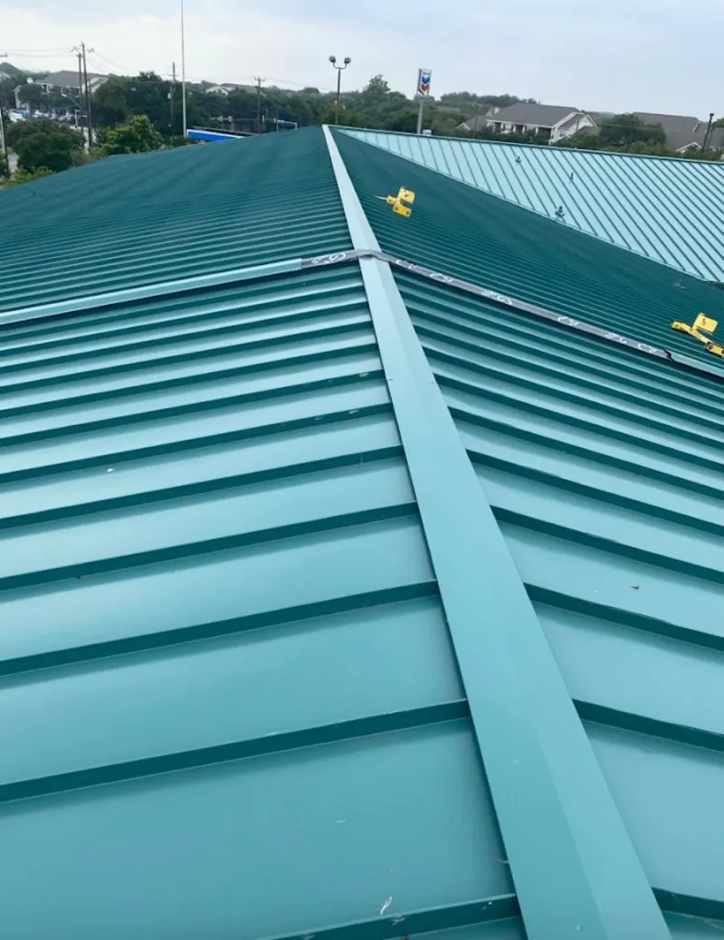 Green commercial metal roof ridge and valley for Metal Roof Repair in Bealeton